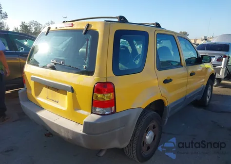 2001 Ford Escape Xls z USA, uszkodzony, nr VIN 1FMYU01161KA71784